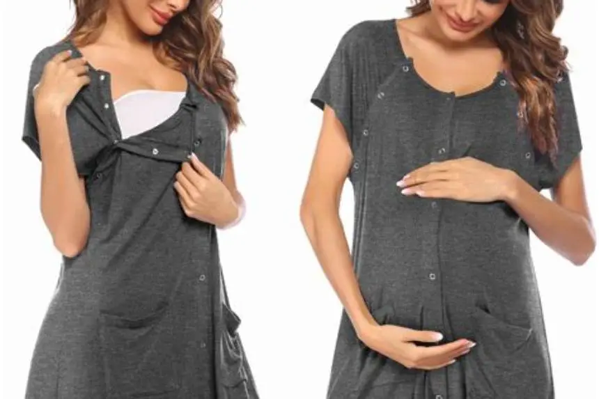 Woman in button front robe holding newborn against chest